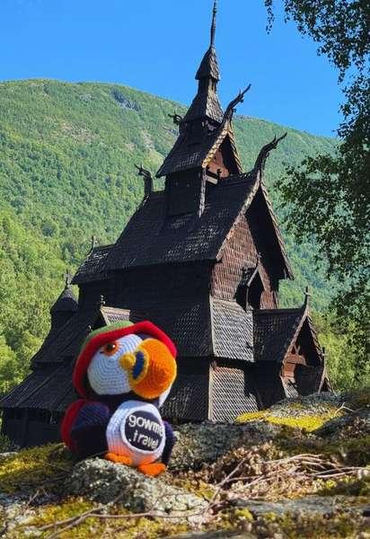Fluffy in front of Borgund Stave Church in Norway