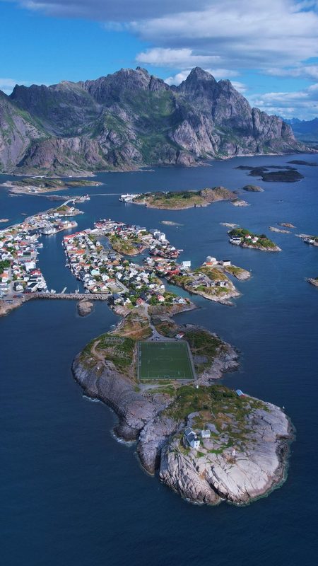 Henningsvær, Northern Norway — Picturesque Lofoten fishing village spread over small islands — home to the world-famous football stadium, art galleries and cafés.