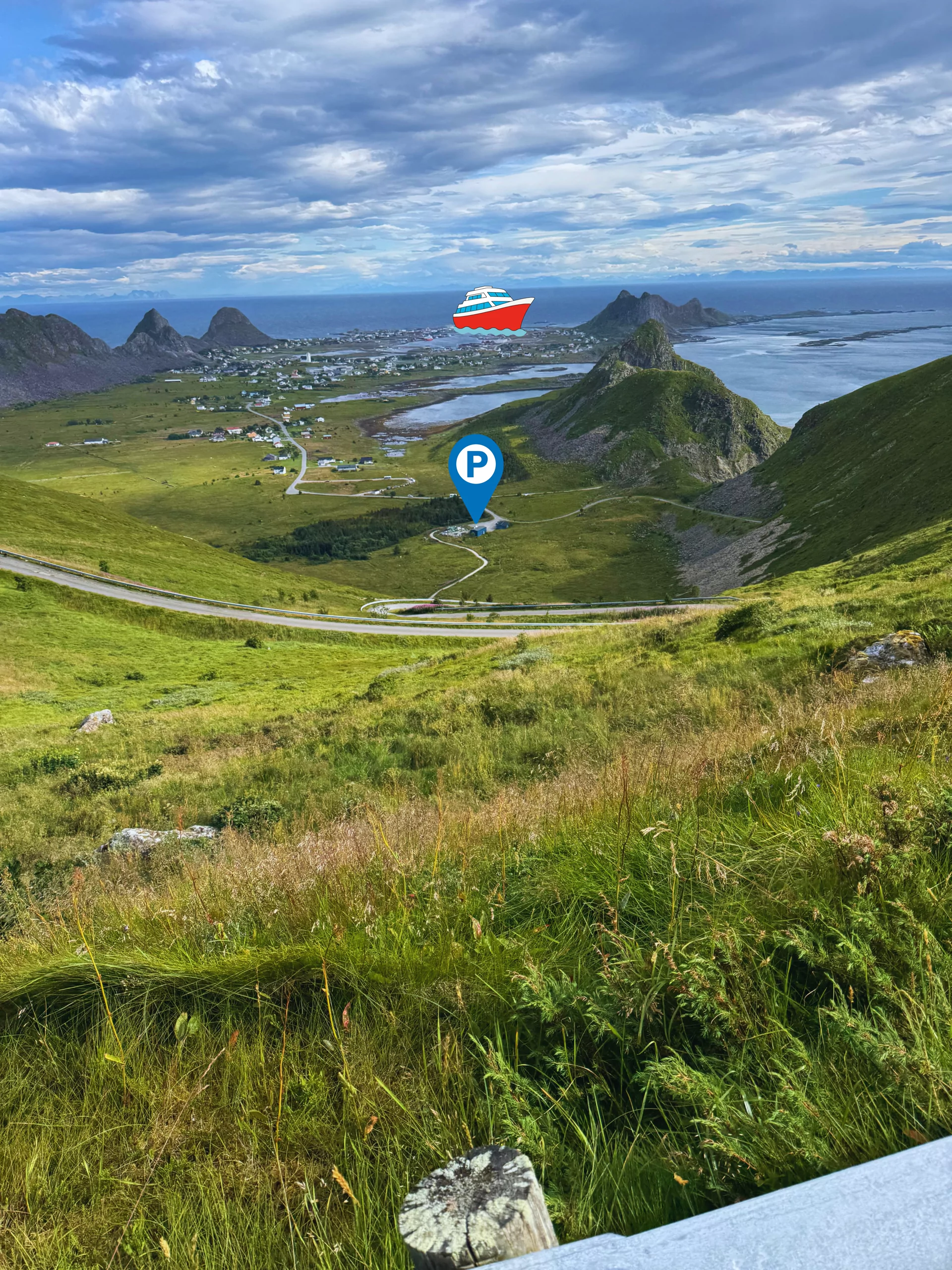 Our view from the Håen trail down to Sørland village, the Værøy ferry harbour and the trailhead parking