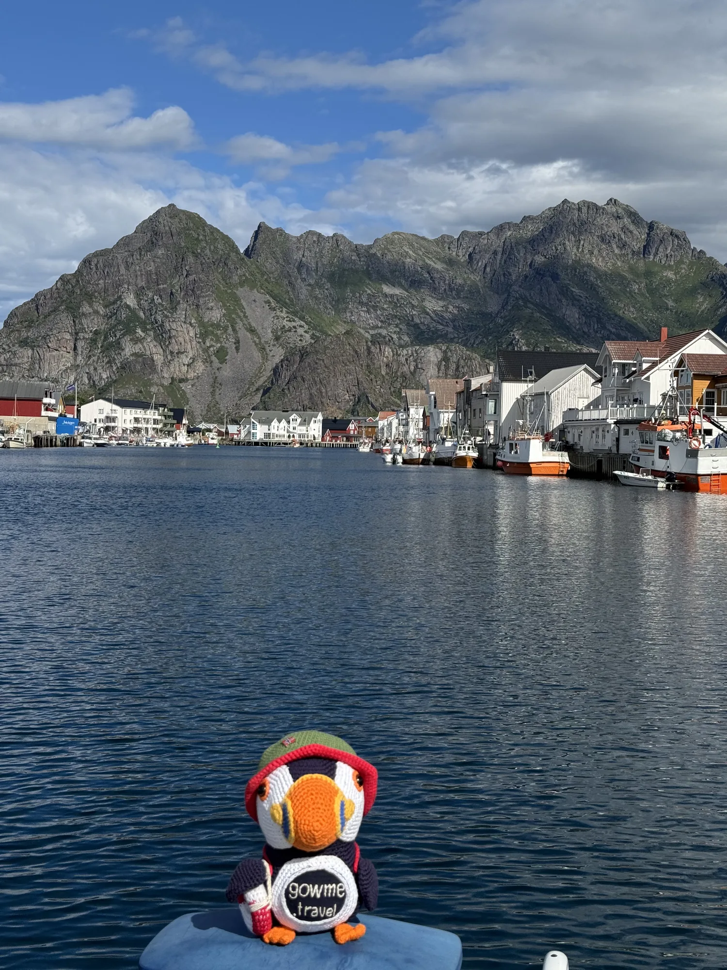 Our Gowme.travel mascot by the Henningsvær harbour on a summer visit, Lofoten